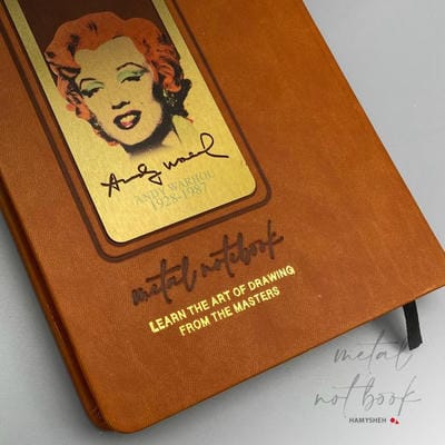 دفتر یادداشت خط دار (طرح METAL NOTEBOOK)  (چند طرح  چرم  لب طلایی  پلاکدار) (زرکوب  رقعی)